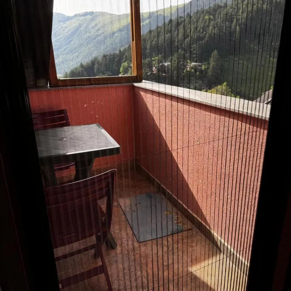 Balcony seating with a view over the valley